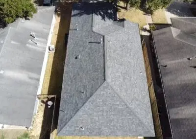 A roof that is being installed on the side of a building.