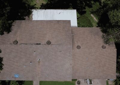 A bird 's eye view of a building with a roof.